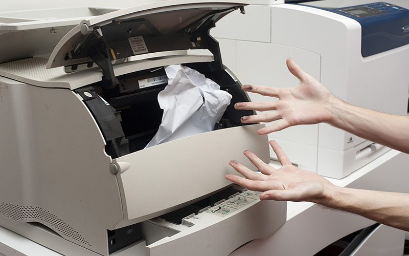 Nguyên nhân máy photocopy bị kẹt giấy